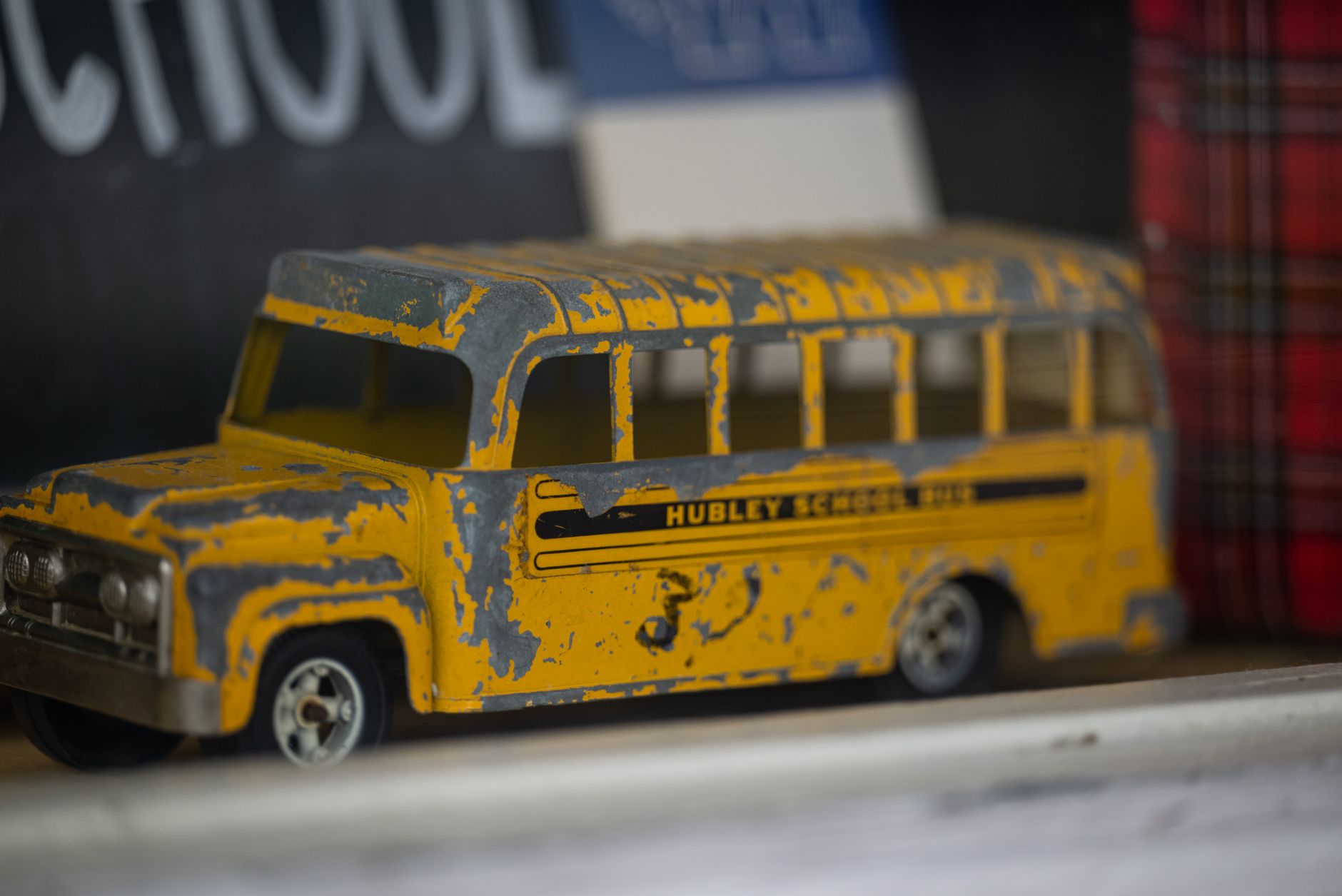 A yellow model bus